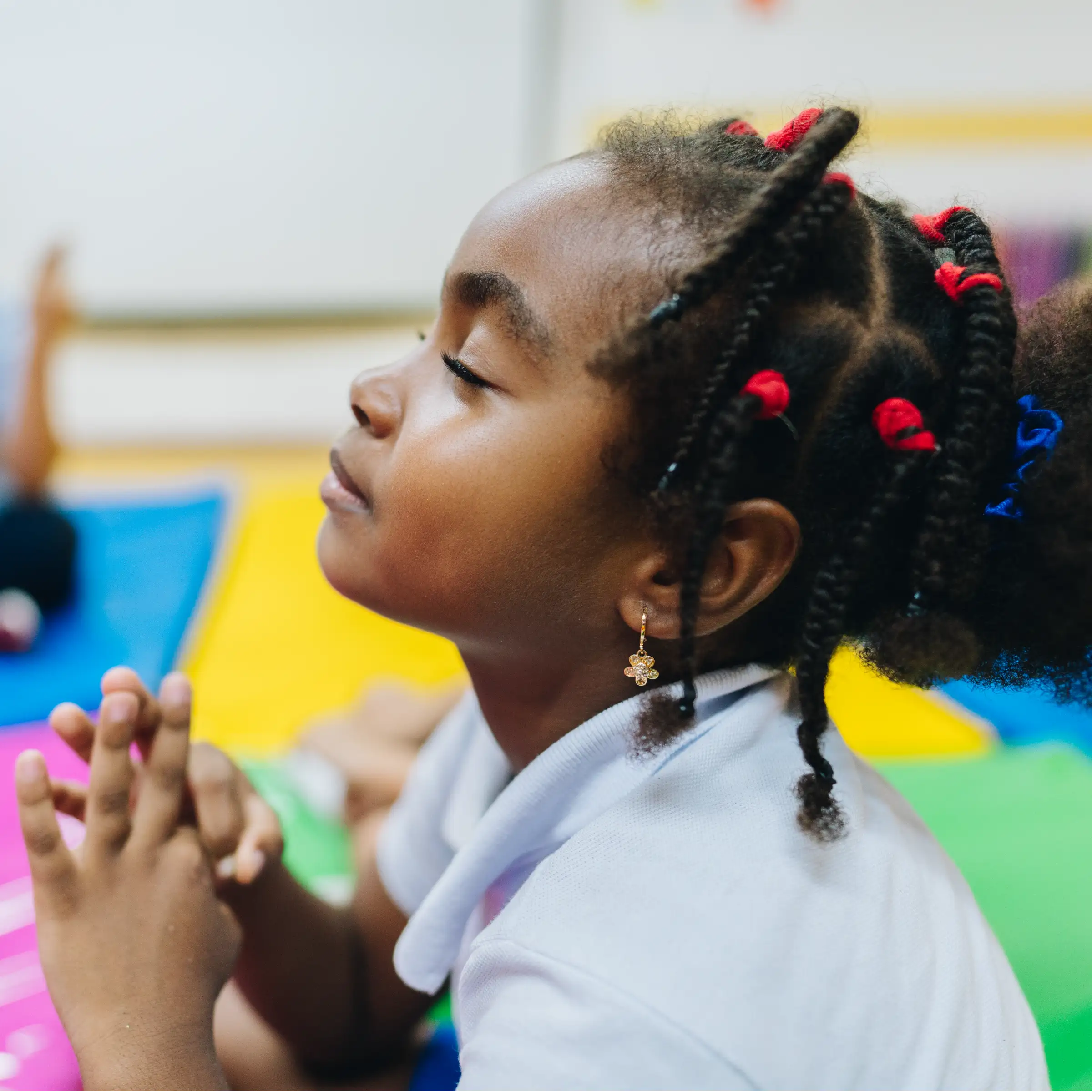 Child Sitting and Praying