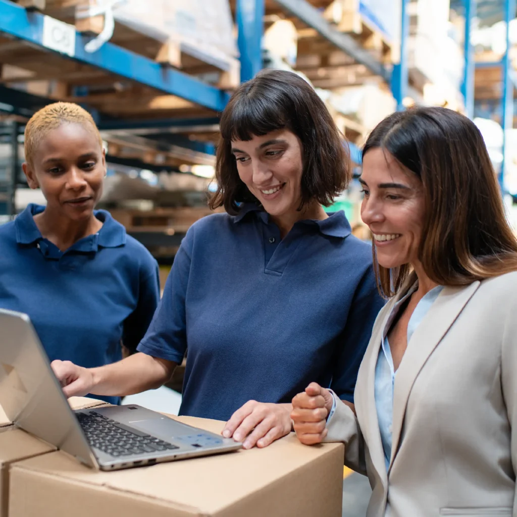 Three Woman In Warehouse
